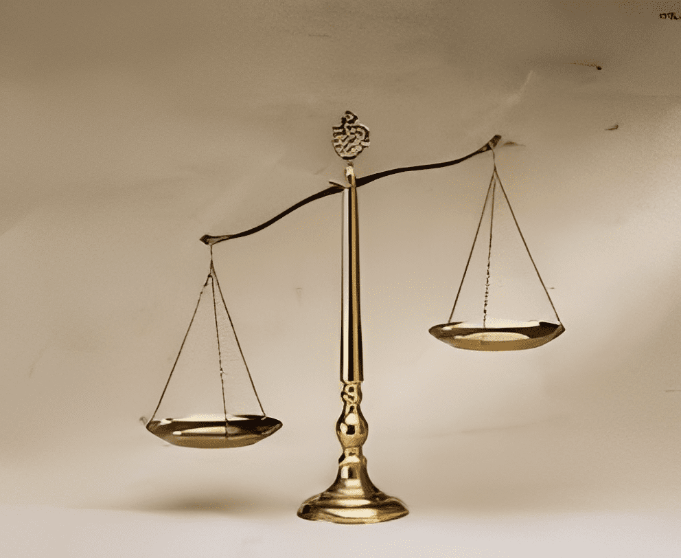 A classic brass balance scale with two empty pans.